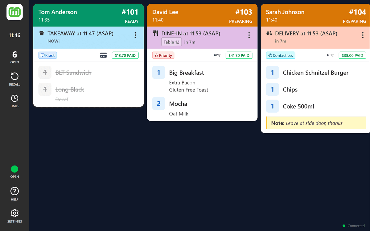 Kitchen Display System showing real-time order cards with status tracking